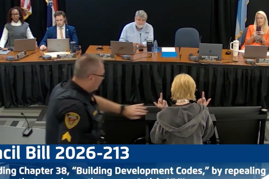 Woman Arrested, Dragged Away After Quietly Speaking About Flock at City Council Meeting